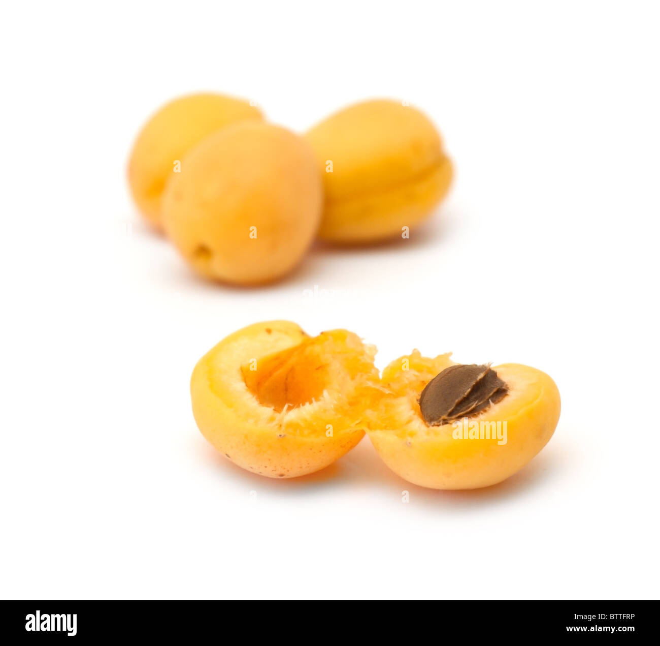 Juicy apricots isolated on white background Stock Photo - Alamy