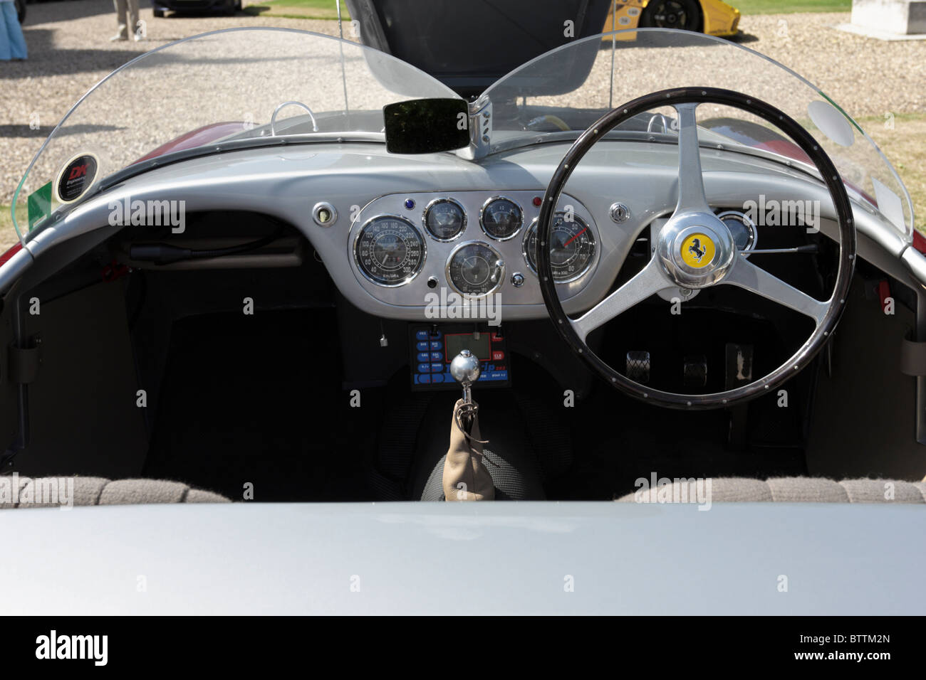 Front dashboard of a Ferrari 166, I am not too sure if it is a Ferrari 166 MM, based upon the cars on display it sure might be. Stock Photo