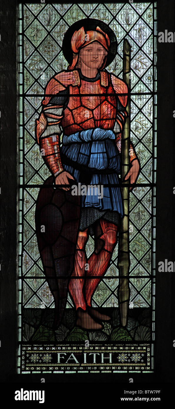 A stained glass window by Edward Burne-Jones depicting Faith, Malmesbury Abbey, Wiltshire Stock Photo