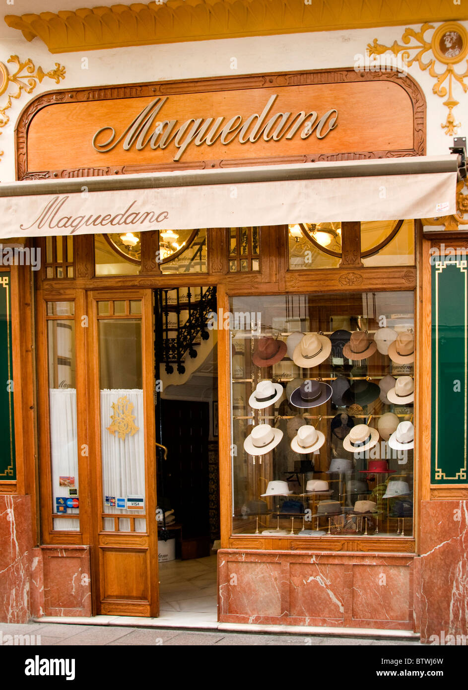 Seville Spain hat shop cap hatter store window Stock Photo