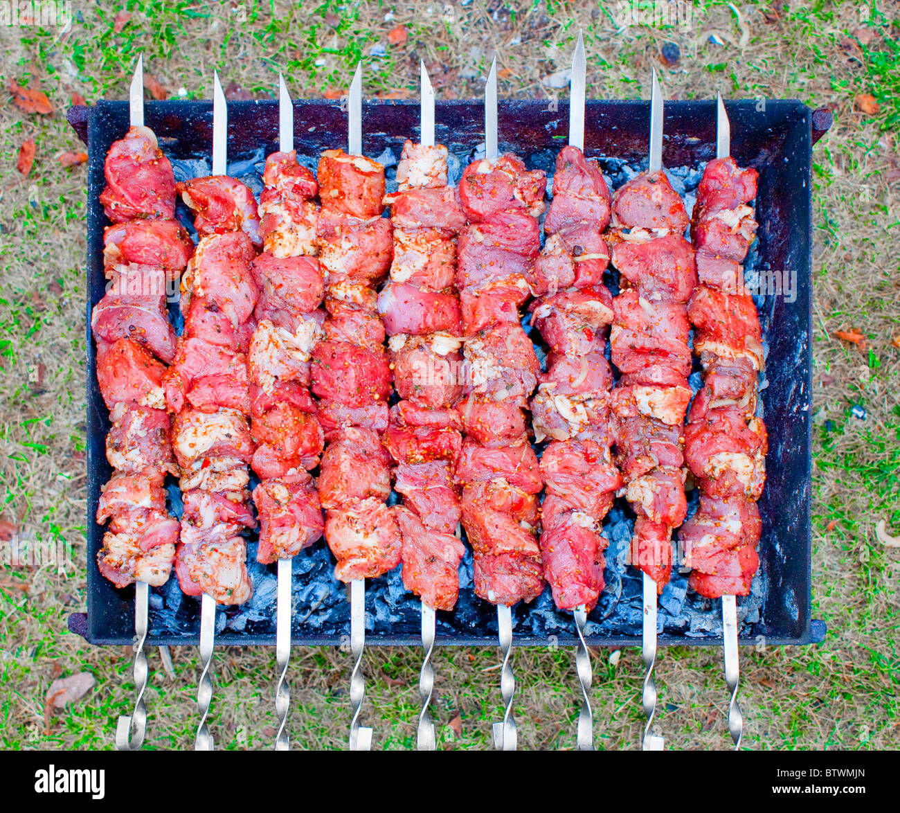 Shish kebab is being grilled over the charcoal grill Stock Photo Alamy