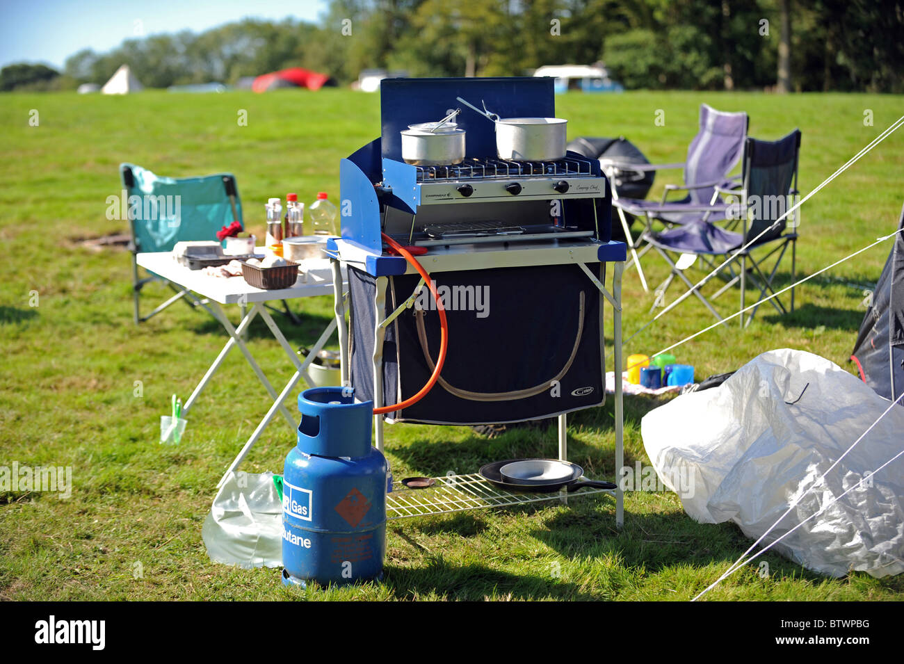 A camping gas cooker ready to make breakfast Stock Photo Alamy
