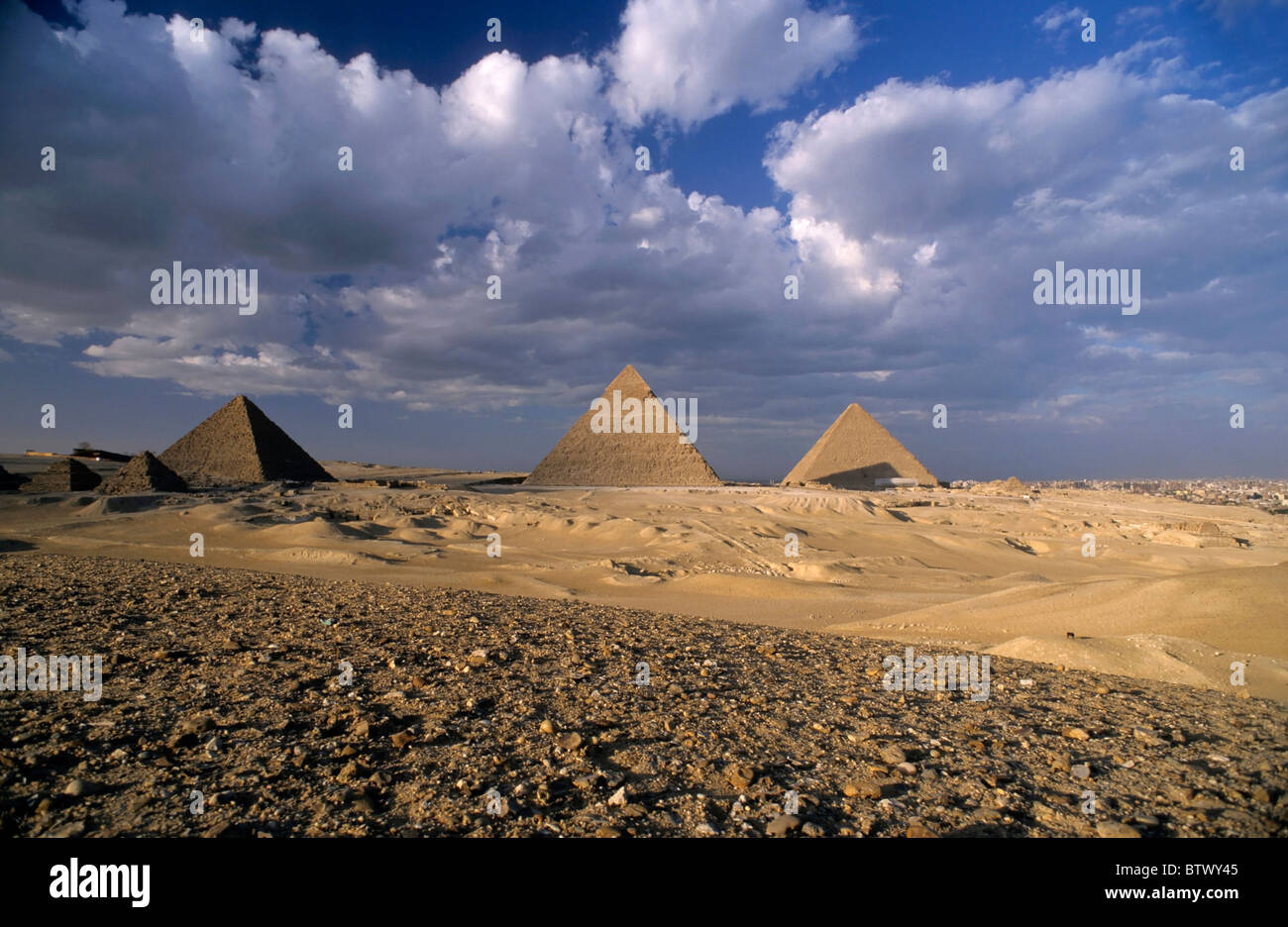 View of The Khephren Pyramid, The Mycerinus Pyramid and The Great Pyramid at Giza, Cairo, Pyramids of Giza, Egypt. Stock Photo