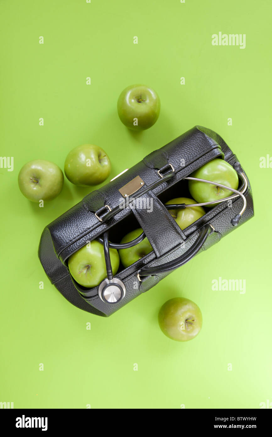 an apple a day keeps the doctor away. Stock Photo