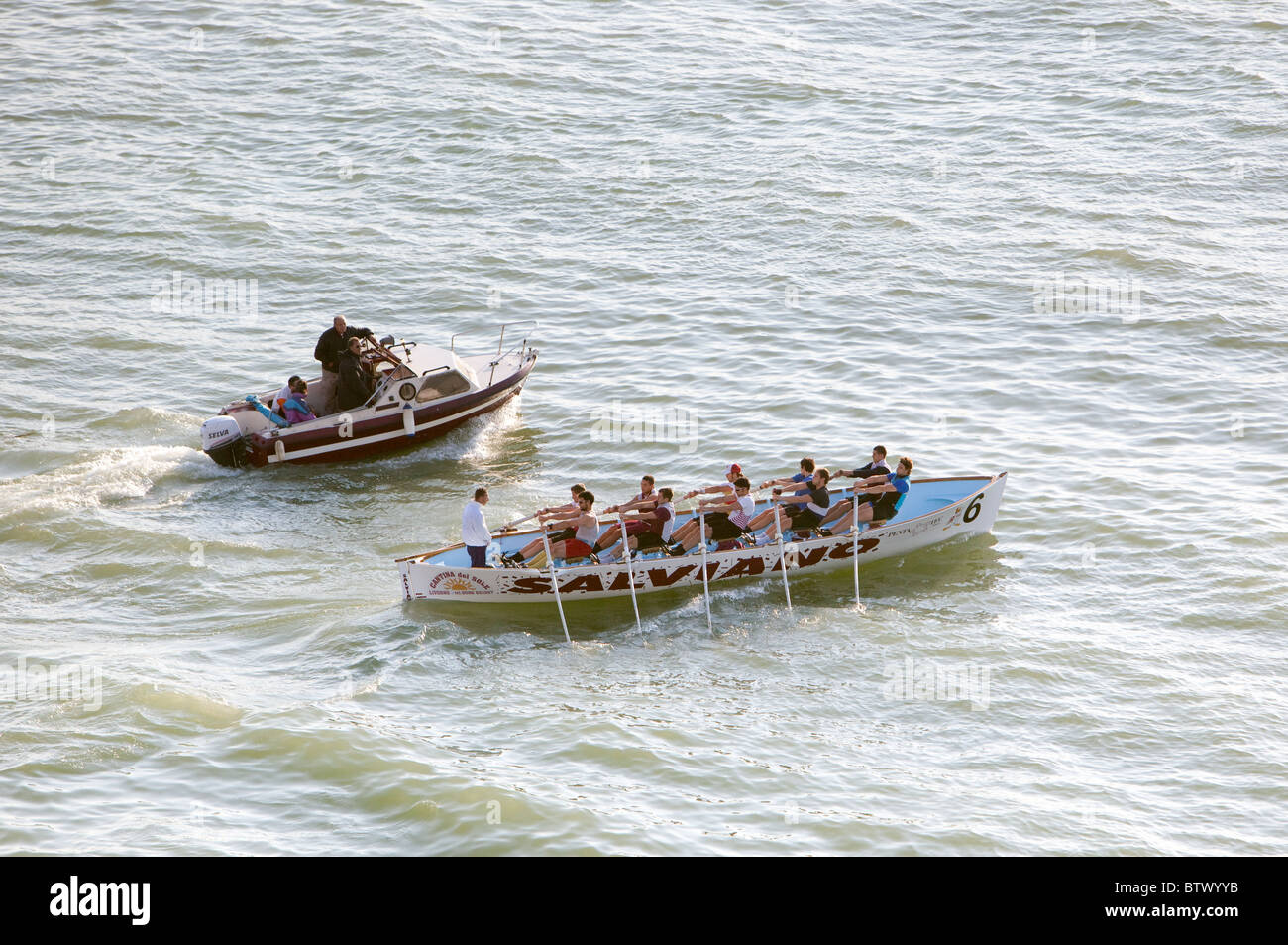 Rowers under instruction .Livorno Harbour Stock Photo - Alamy