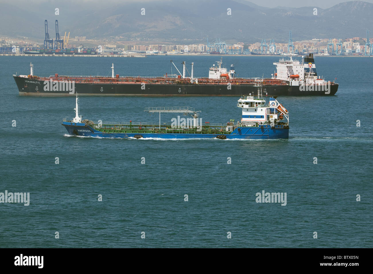 Bunkering tankers busy in operation just off Gibraltar Harbour Stock Photo