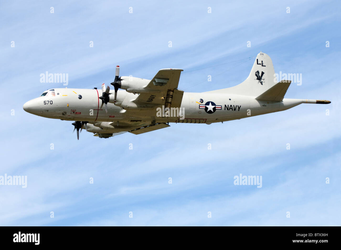 Lockheed P-3C Orion operated by the US Navy climbing out after take off from RAF Fairford Stock Photo