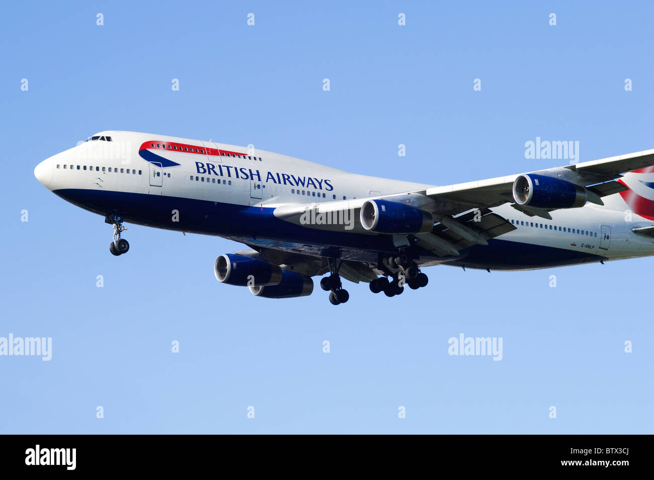 Boeing 747 Jumbo Jet operated by British Airways on approach for landing at London Heathrow Airport Stock Photo