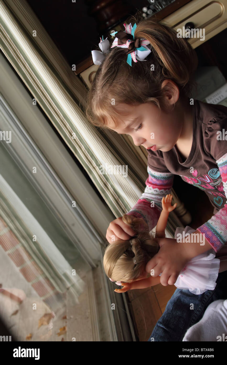 Little Girl with Toys Stock Photo