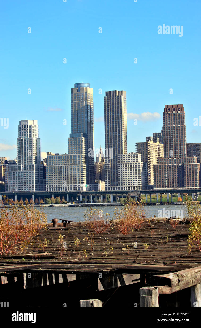 View of the west side of midtown Manhattan New York City from abandoned pier in New Jersey Stock Photo