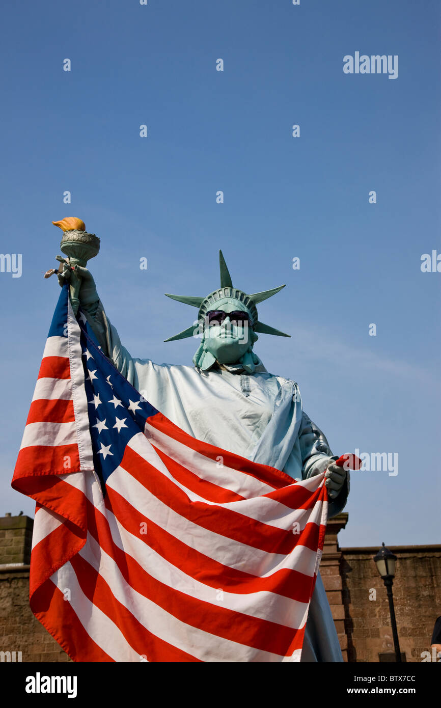 Street entertainer as the Statue of Liberty in Battery Park Stock Photo