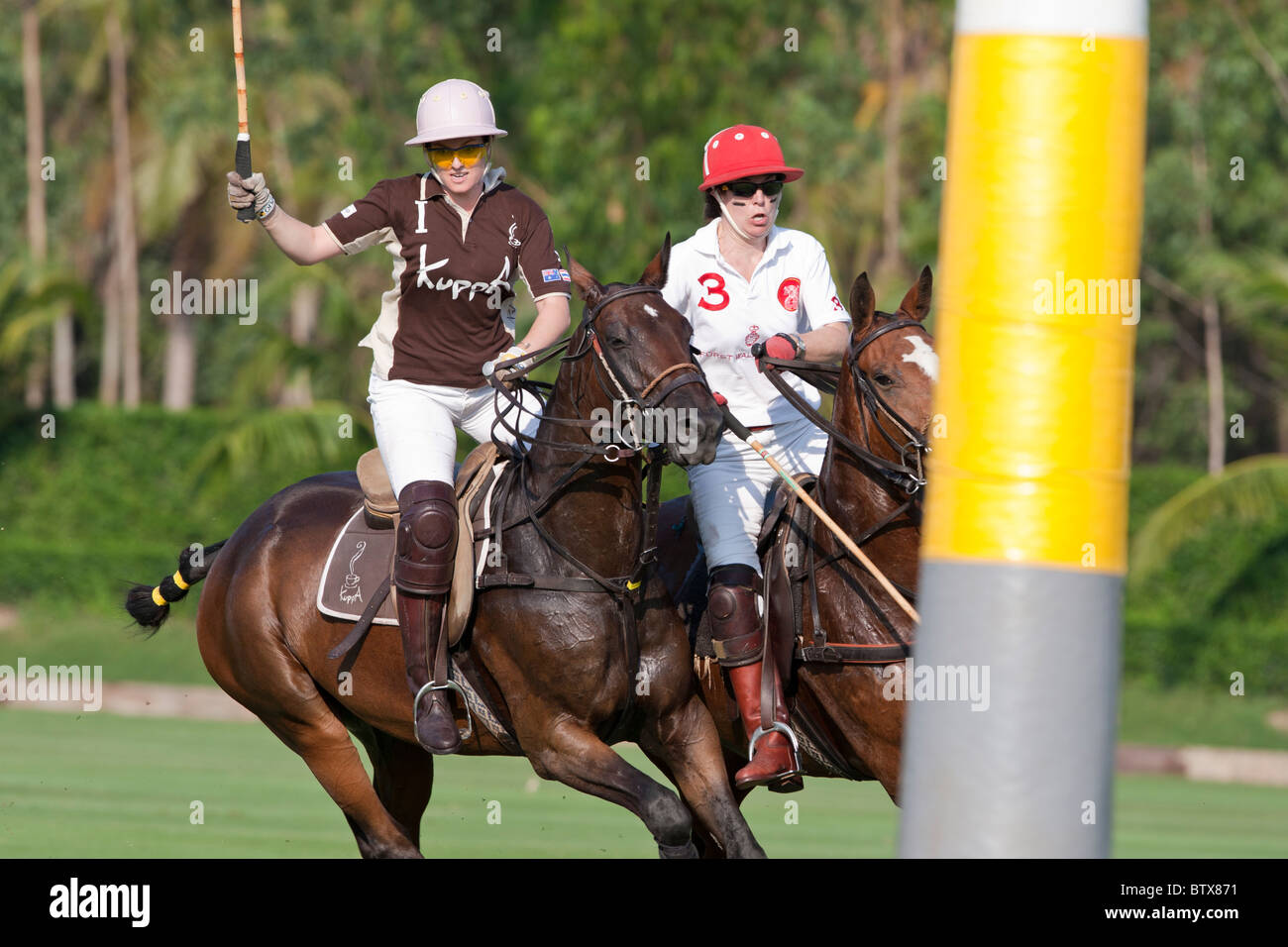 Two female polo players at the goal Stock Photo Alamy