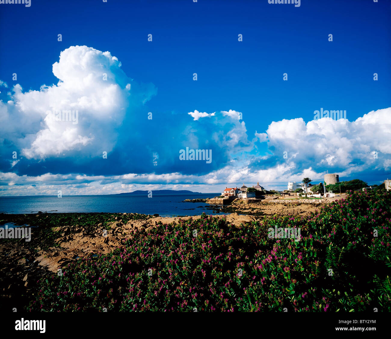 Sandycove, Co Dublin, Ireland; The James Joyce Tower And Museum In The Distance In A Village On