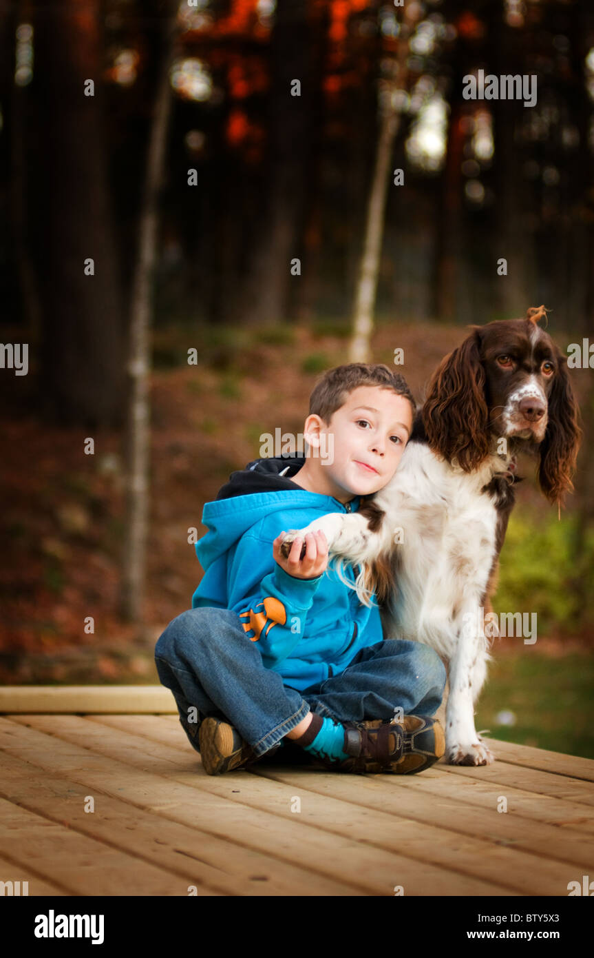 young boy with his pet dog Stock Photo - Alamy
