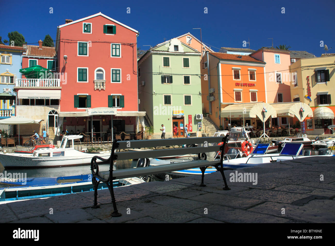 Colorful houses surrounding picturesque little port of Veli Losinj on Losinj Island, Croatia Stock Photo