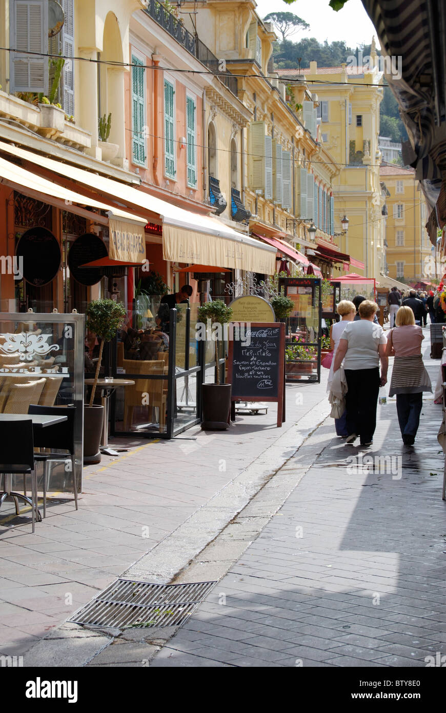 Street with restaurants in the Old Town of Nice. Cote d'Azur. France Stock Photo