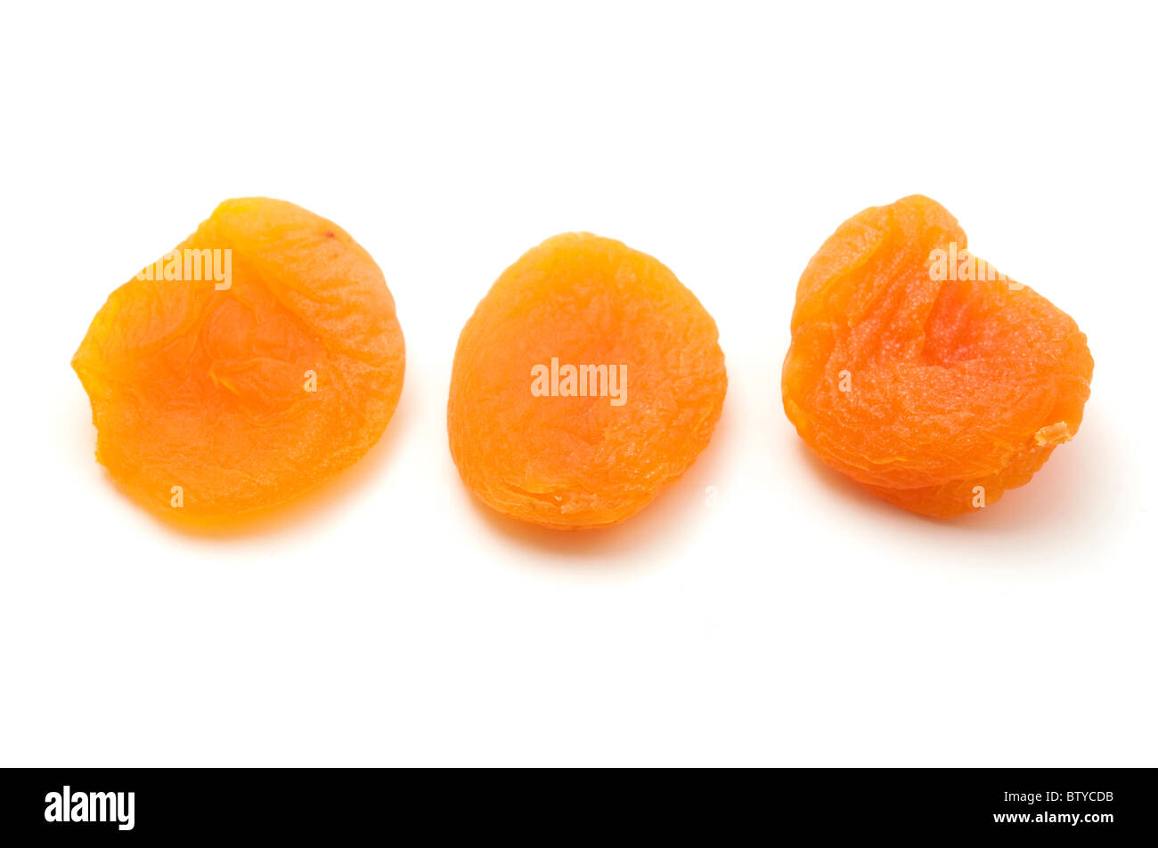 Dried apricots on a white background Stock Photo