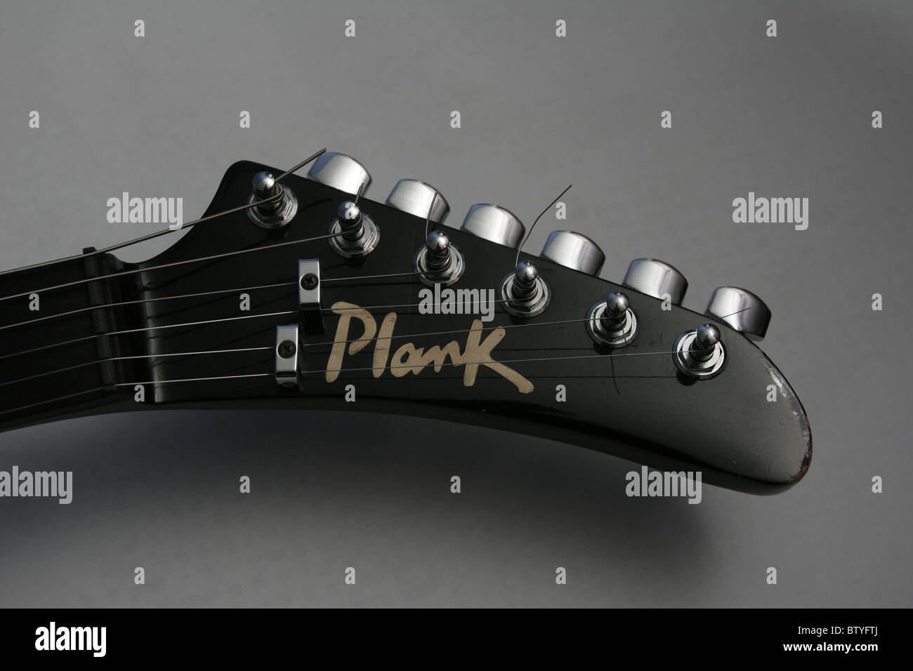 'Plank' Explorer electric guitar (detail). Plank makes guitars for Radiohead, Joe Strummer and The Cult. Stock Photo