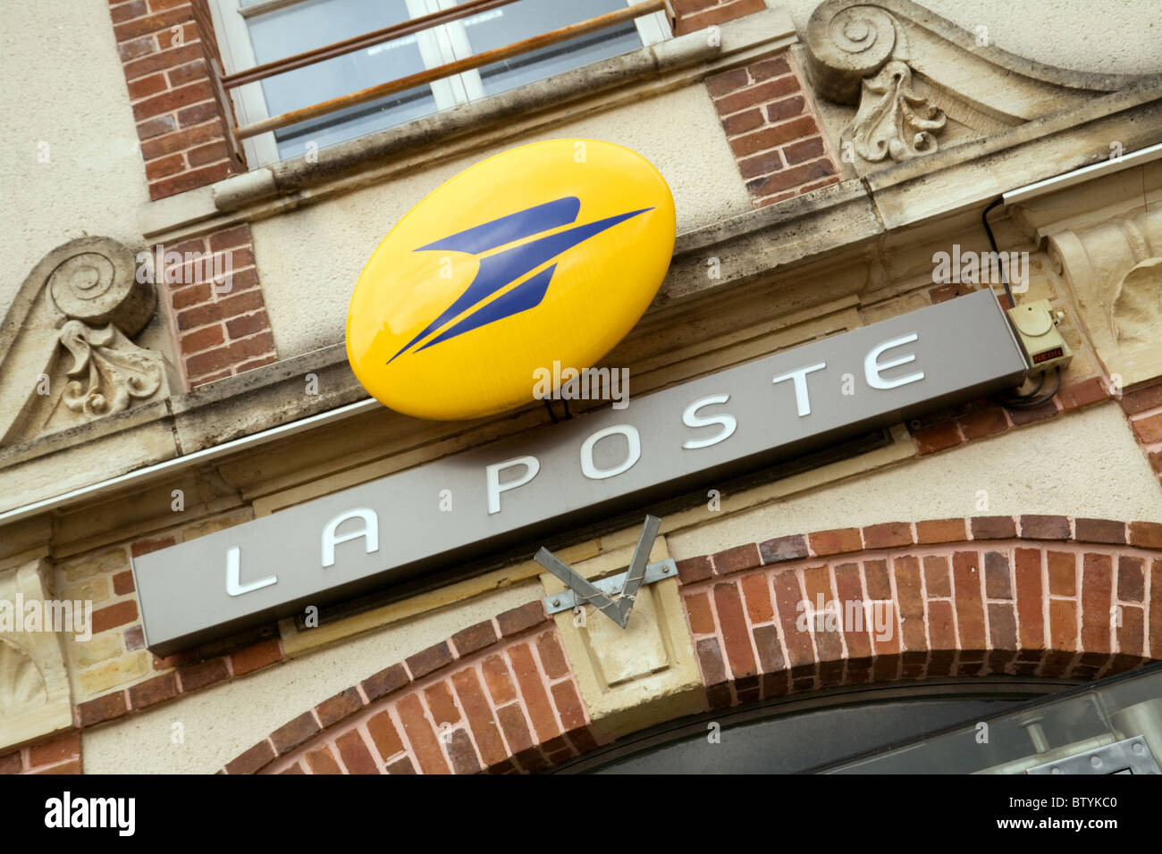 French Post Office (Bureau de Poste, La Poste) sign on the building in Coulommiers, Northern France Stock Photo