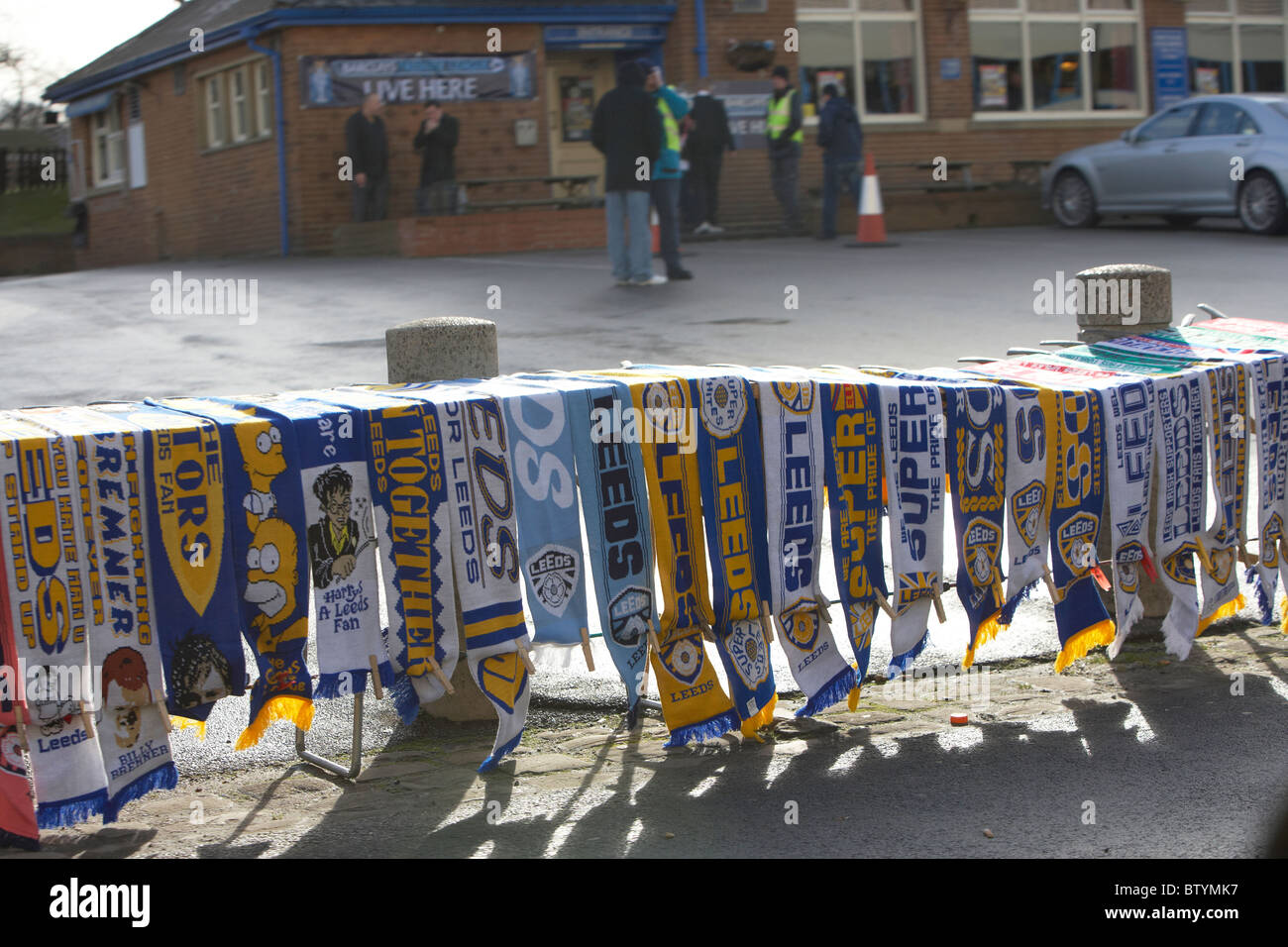 Fans scarfs on table for a Leeds Utd football game Stock Photo