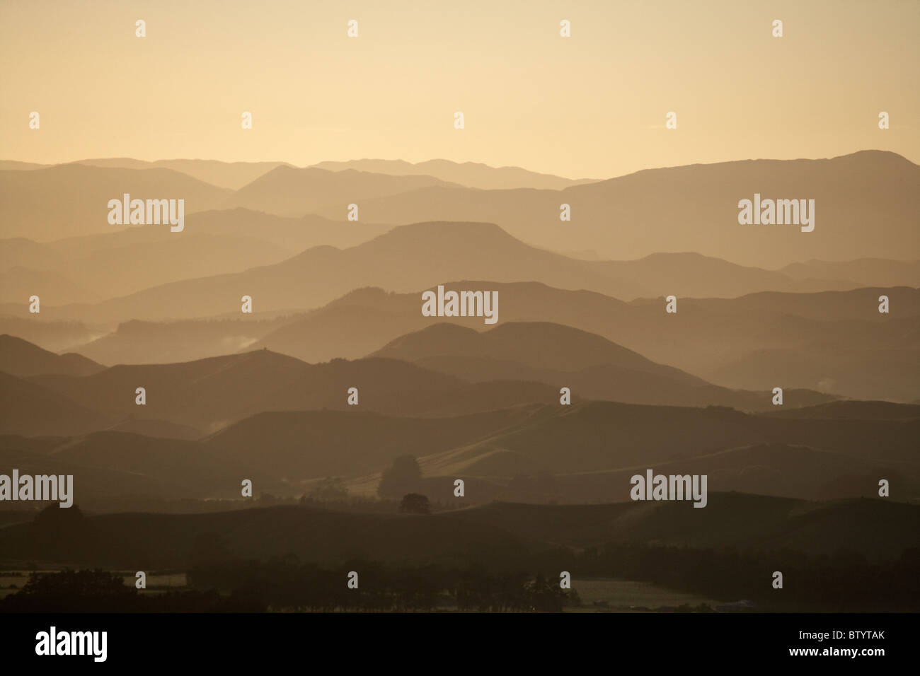 Early light over hills and farms near Woodville, Tararua District, Wairarapa, North Island, New Zealand Stock Photo