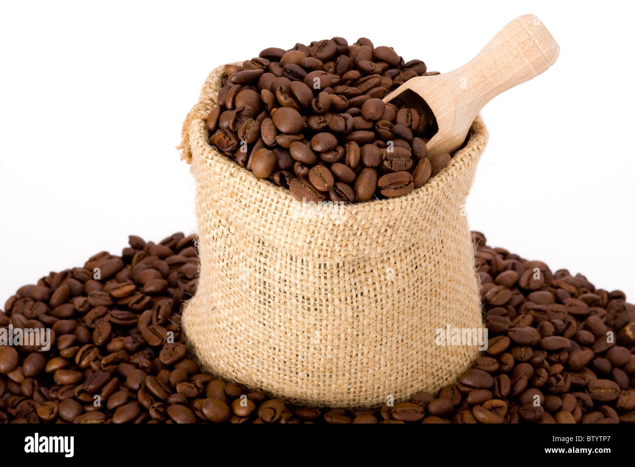 Coffee beans in burlap sack Stock Photo