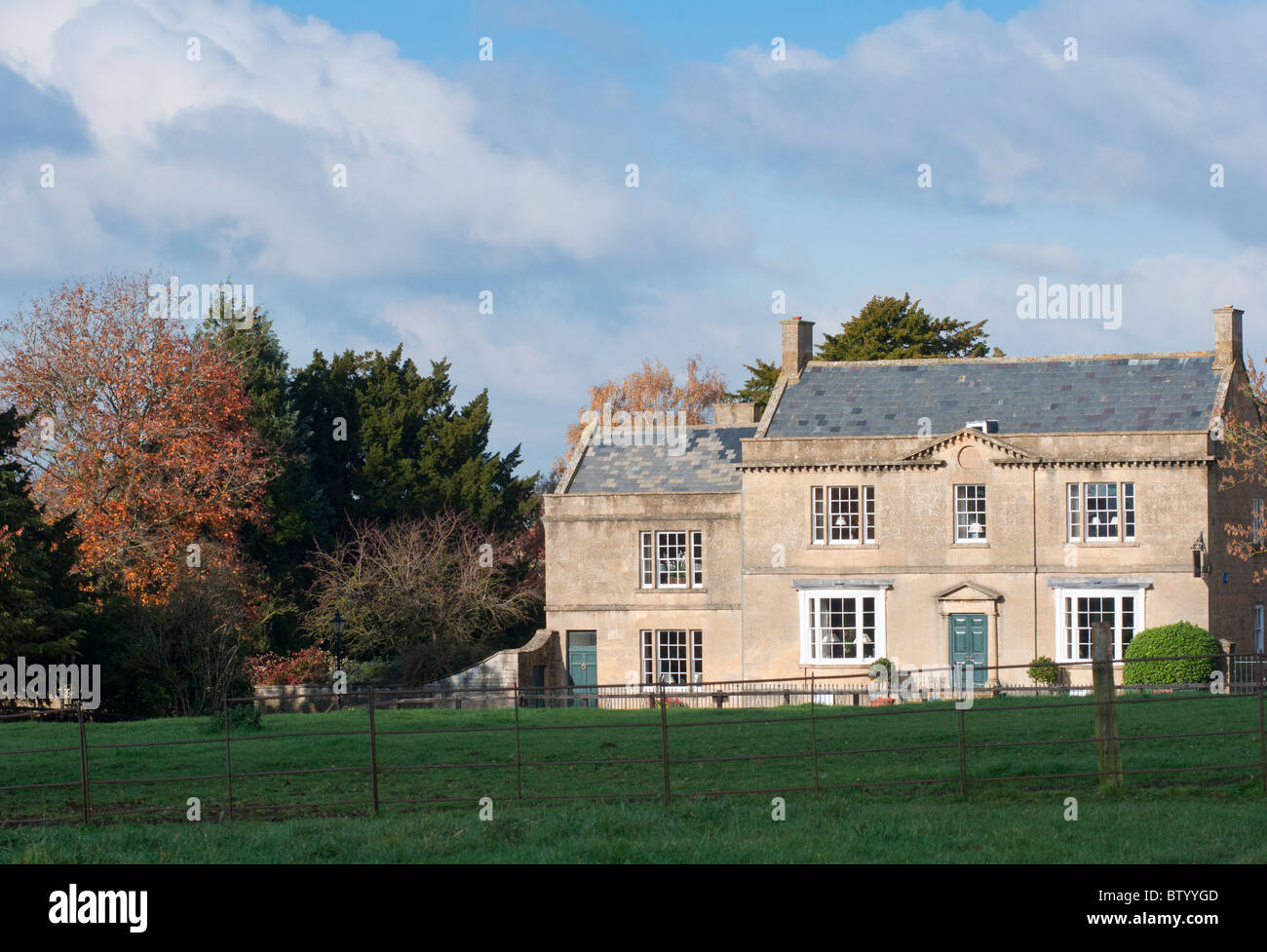 A house in a rural setting in the Cotswold village of Broadway, UK Stock Photo