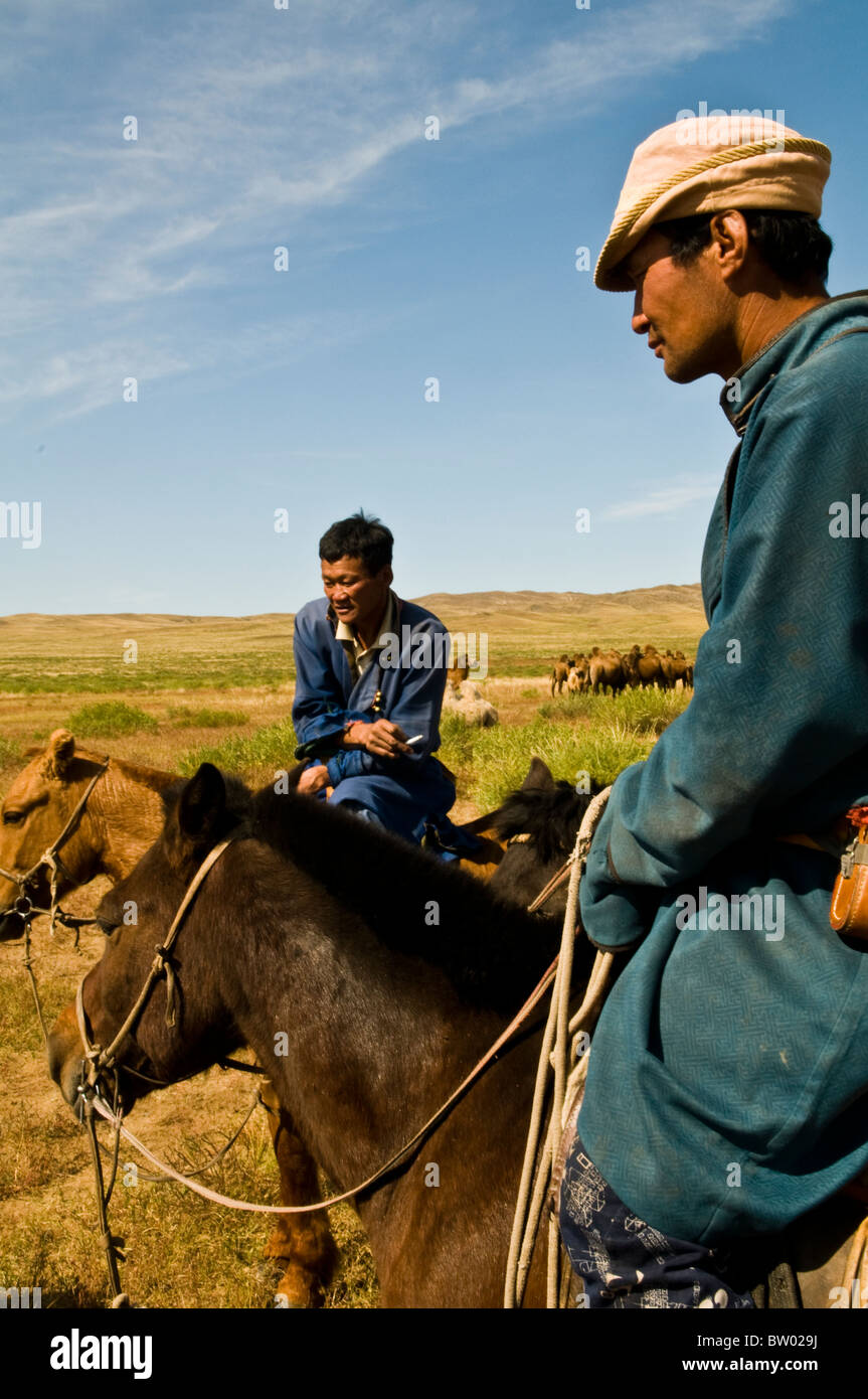 Mongolian nomads on their horses Stock Photo - Alamy