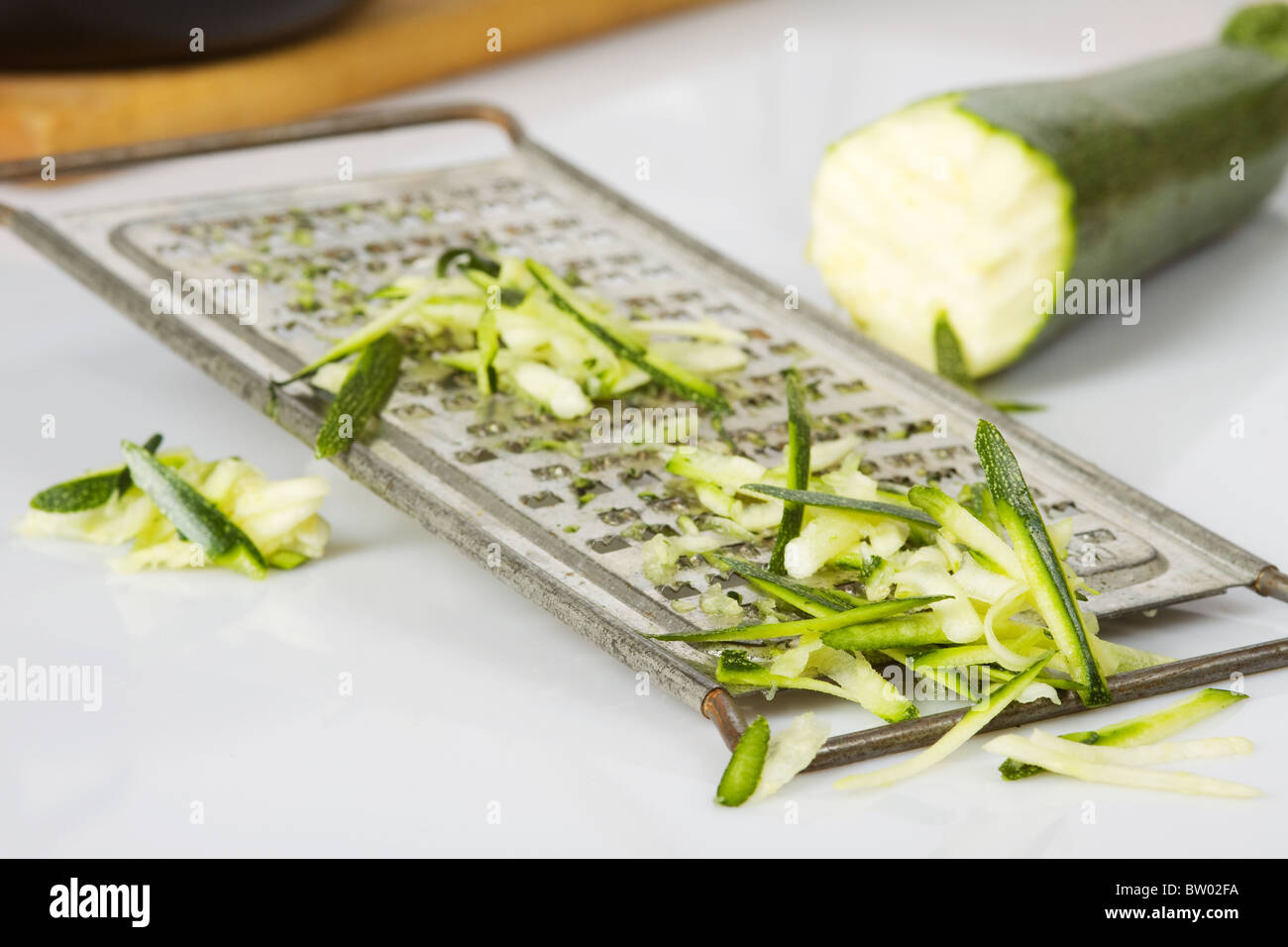 zucchini and grater Stock Photo Alamy