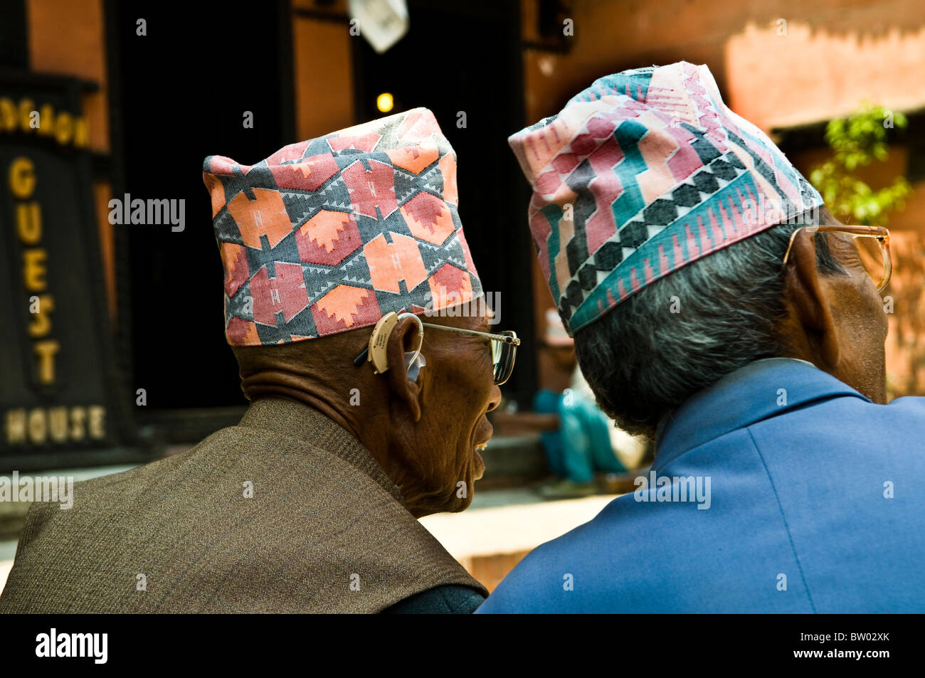 Nepali men wearing their traditional Nepali hats. Stock Photo