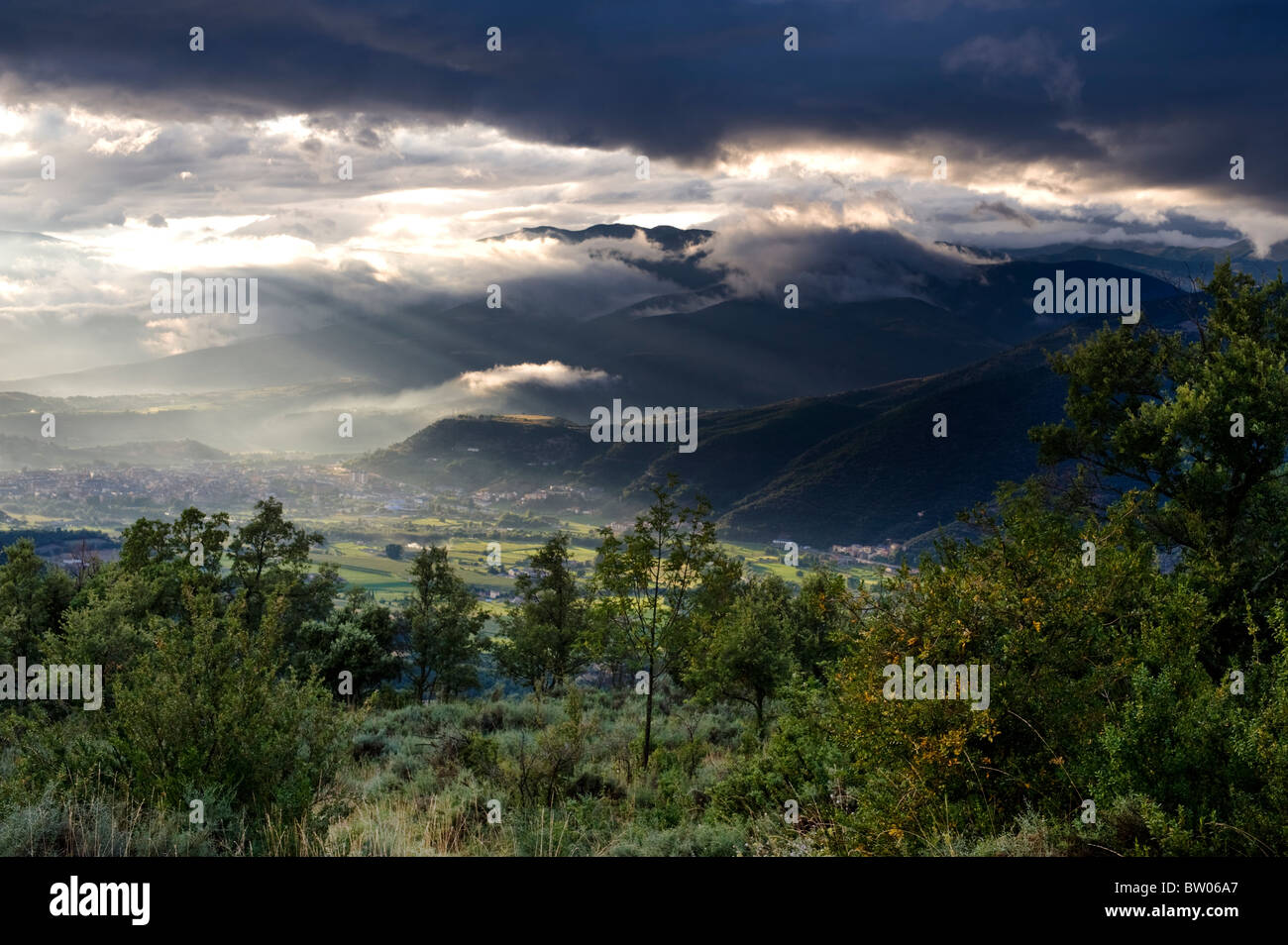 View from the village of Ortedo towards the town of La Seu d'Urgell, in the Pyrenees of Catalonia, Spain, after a thunderstorm Stock Photo