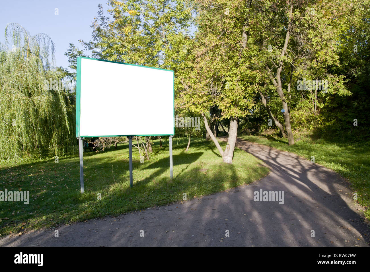 Clear billboard in forest Stock Photo - Alamy