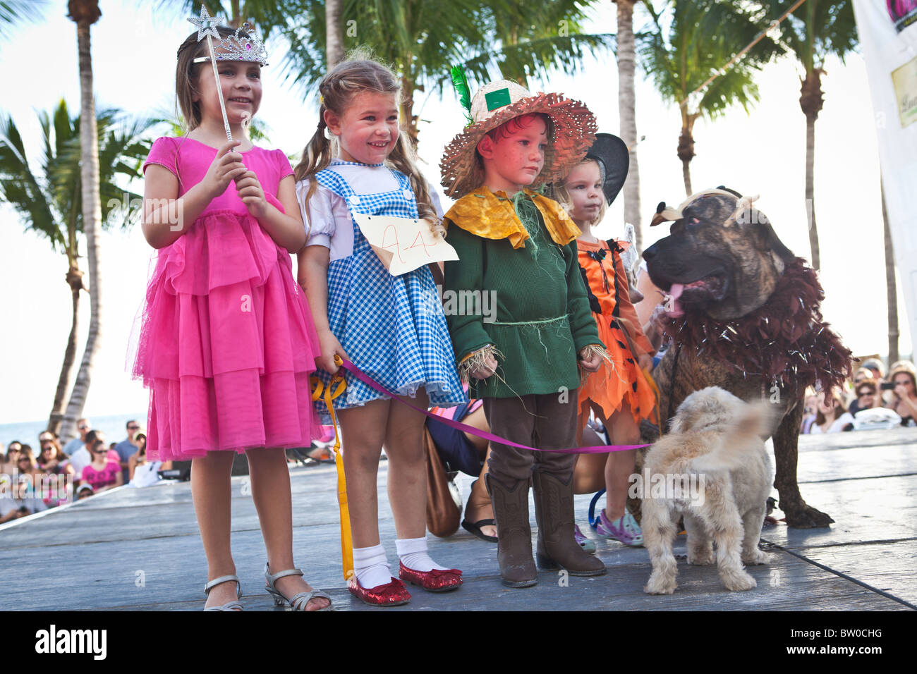 Costumed children participate in the Pet Masquerade at the annual Fantasy Fest Key West, Florida. Stock Photo