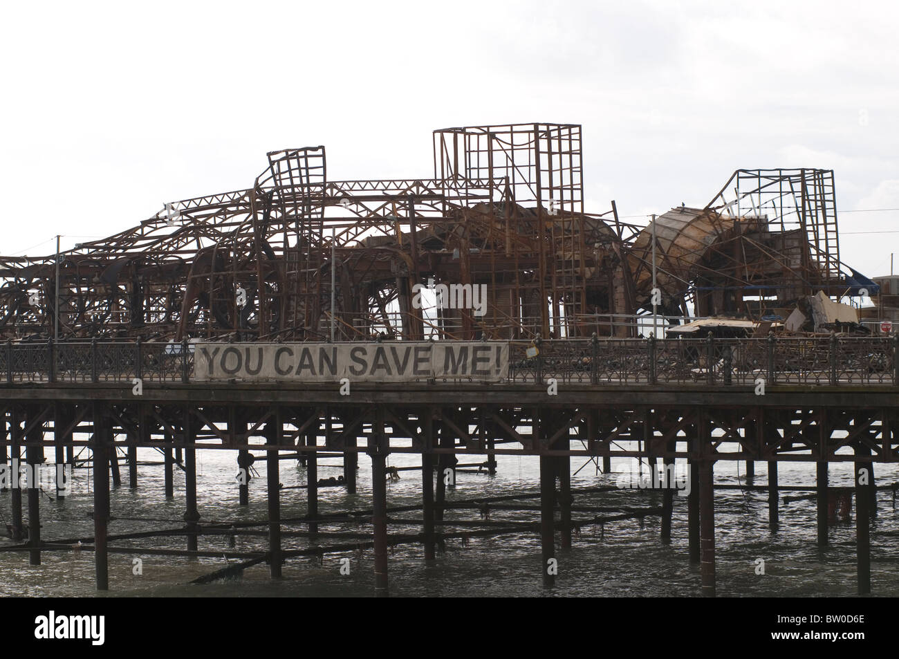 hastings pier east sussex uk after fire in october 2010 burnt burning down closed to the public timber seaside attraction twiste Stock Photo
