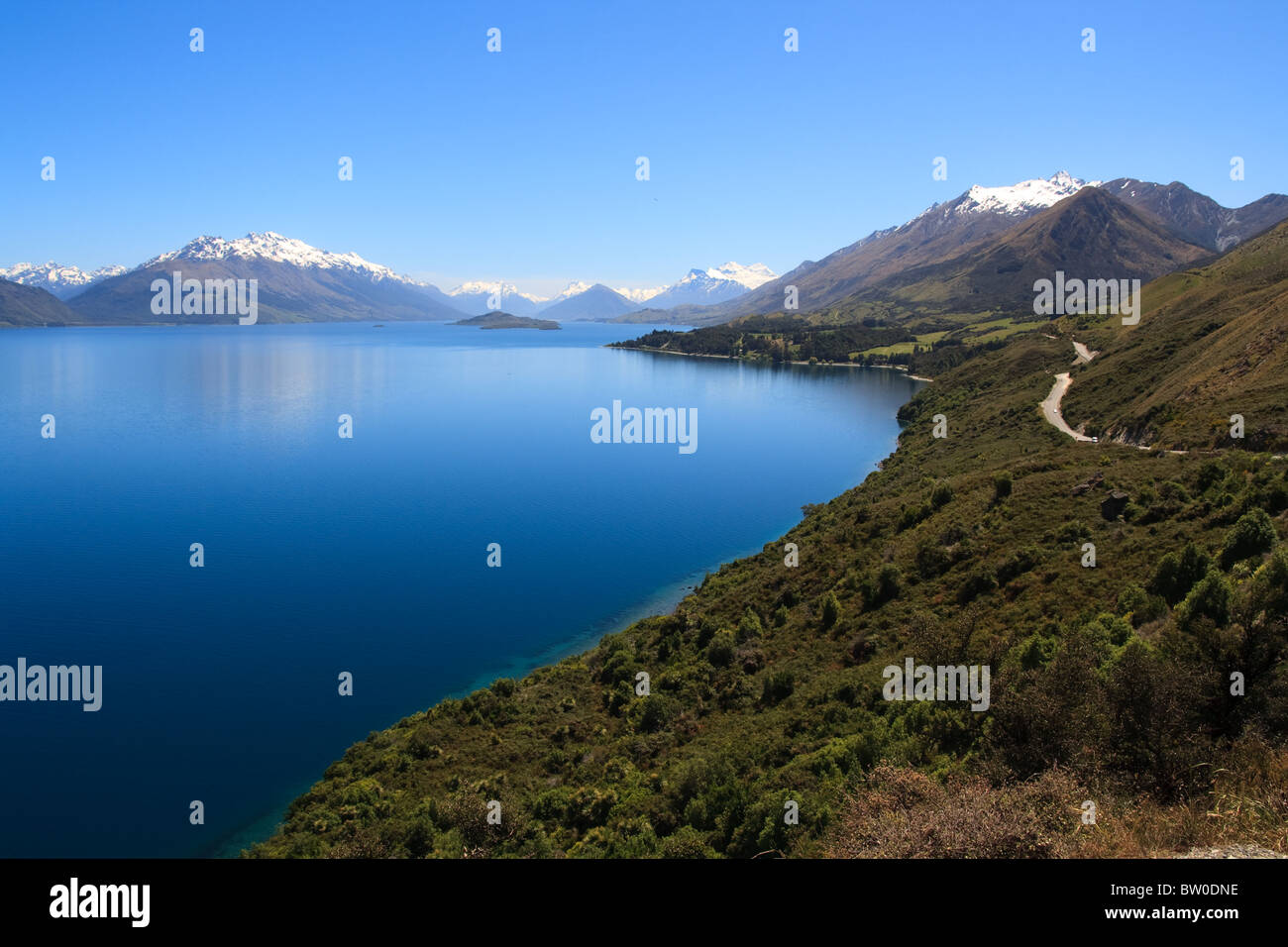 Scenic view of Lake Wakatipu with Southern Alps in background near Queenstown, South Island, New Zealand Stock Photo