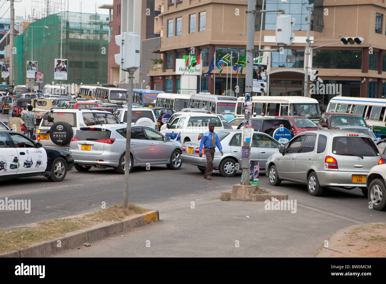 Dar es Salaam, Tanzania. Traffic at Intersection of India and Azikiwe Streets, in front of the Holiday Inn. Stock Photo