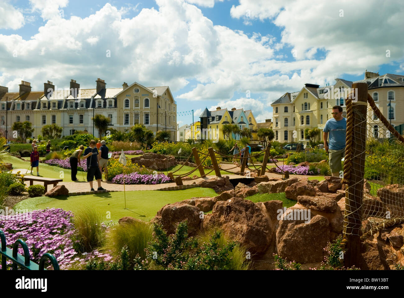 Holiday makers playing crazy golf in Teignmouth Devon England UK 2010 Stock Photo