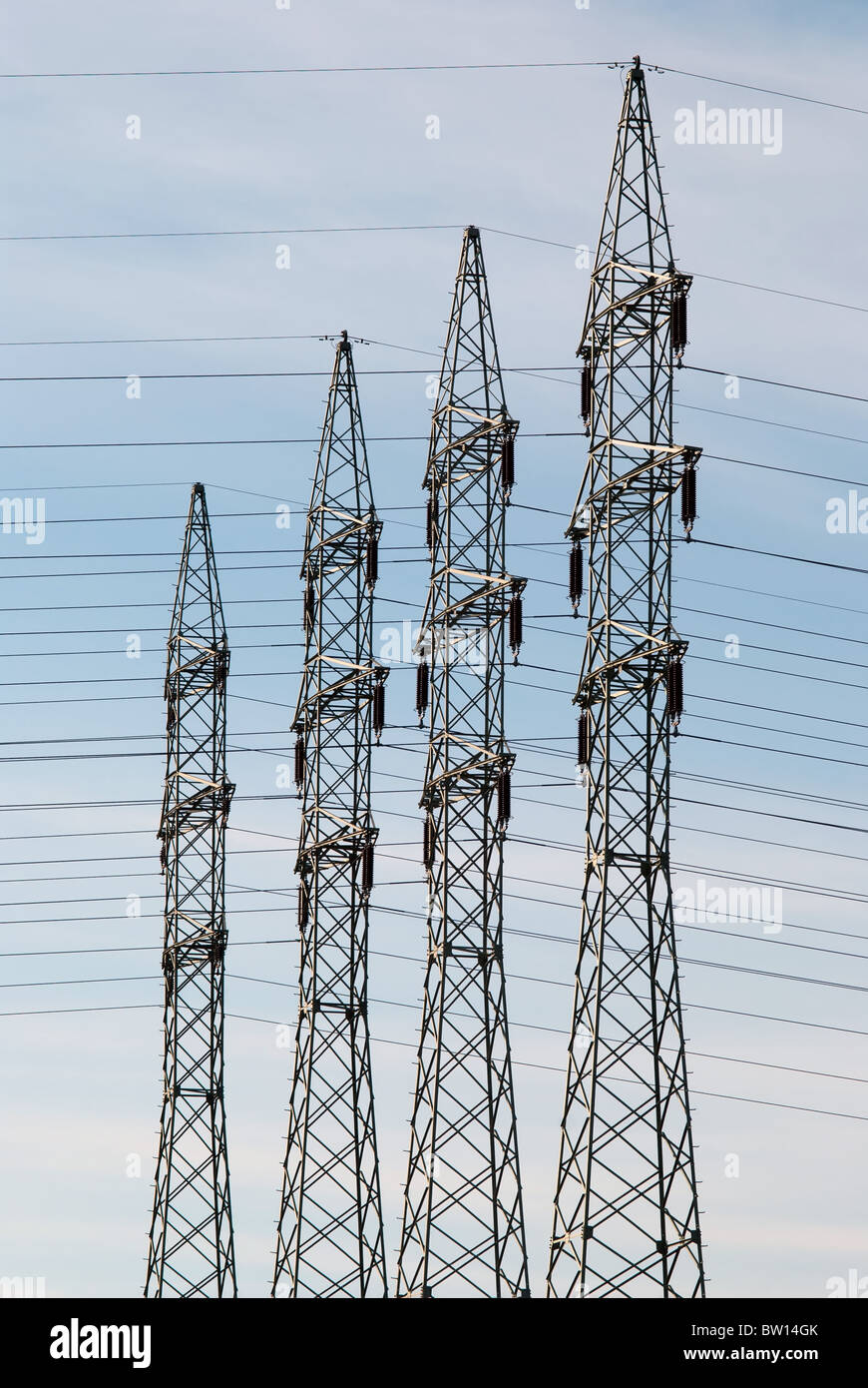 Power line against blue sky and sun power lines hi-res stock ...