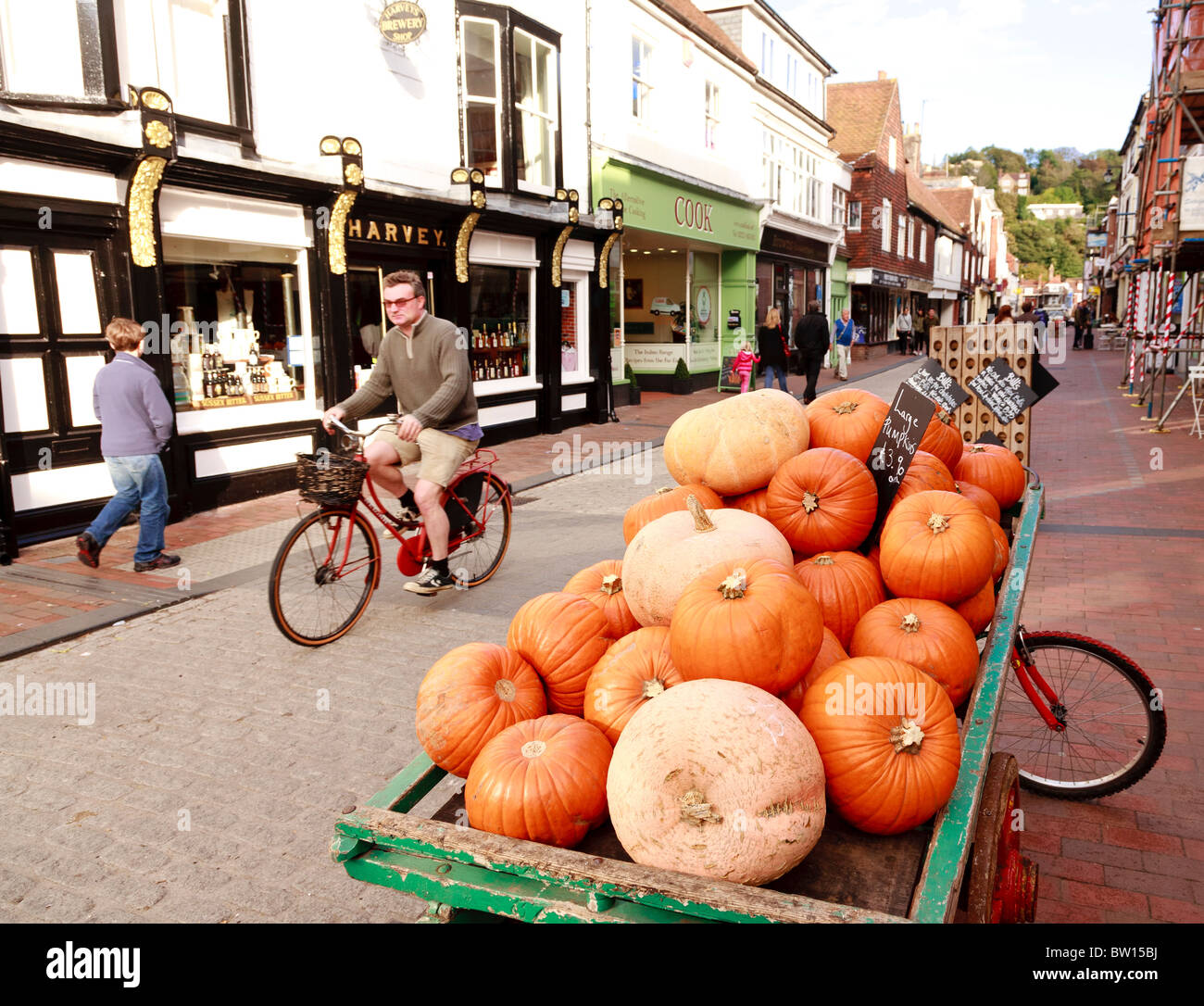 Street scene in Cliffe High Street Lewes, Sussex in Autumn with pumpkins on display Stock Photo