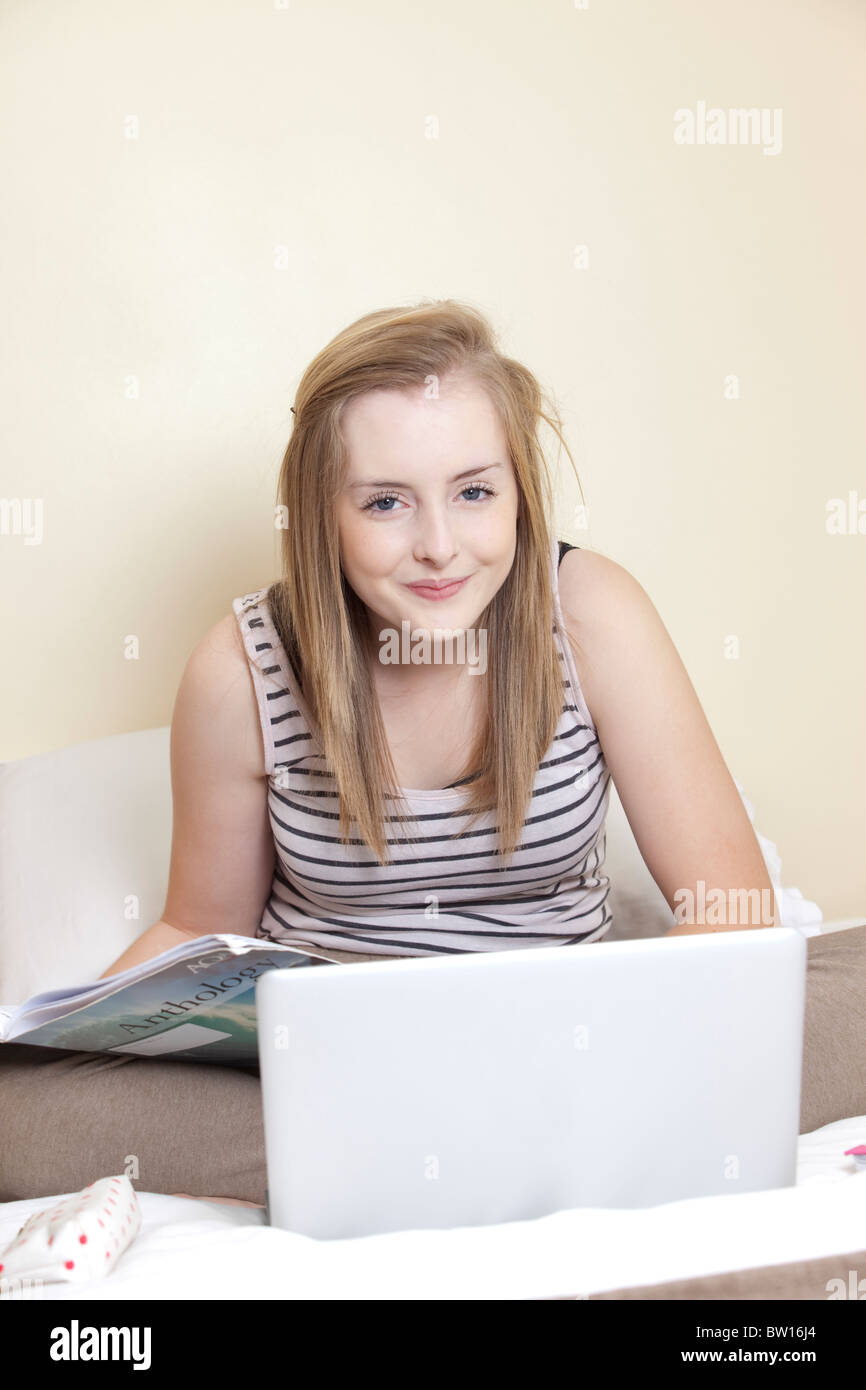 A teenage girl studying in her bedroom UK Stock Photo - Alamy