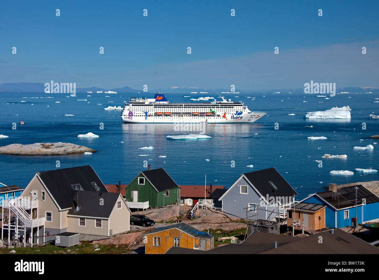 Cruise ship in bay in front of the town Ilulissat / Jakobshavn, Disko-Bay, Greenland Stock Photo