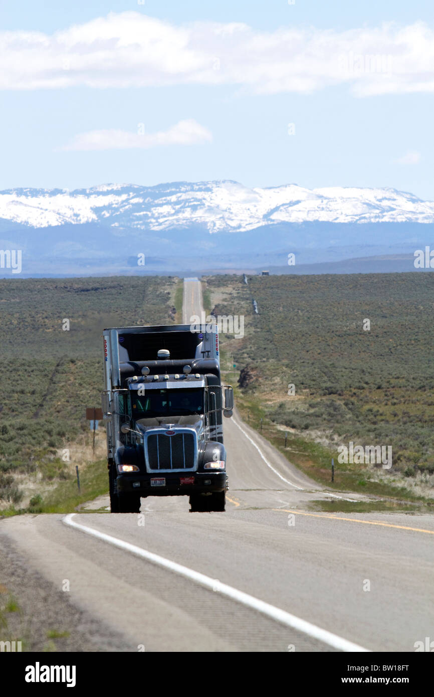 Transport truck traveling on Highway 95 near Jordan Valley, Oregon, USA. Stock Photo