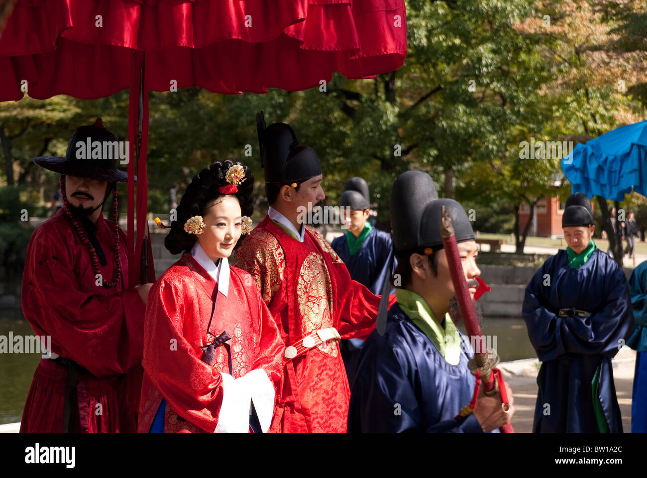 A reenactment of the King and Queen of Korea walking through Gyeongbok