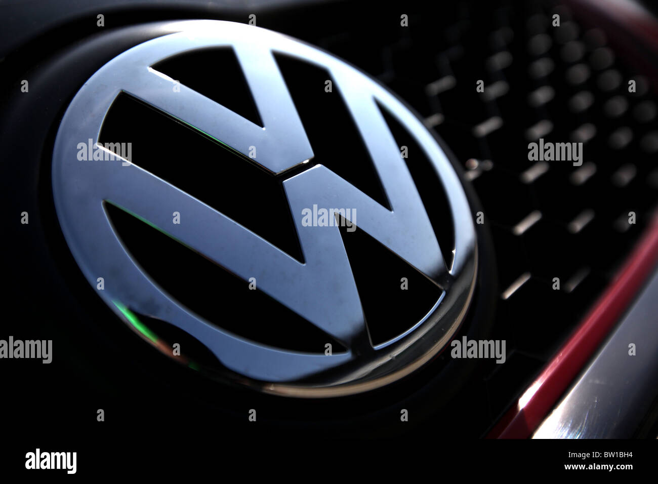 Volkswagen badge or logo on the front grill of a VW Golf Stock