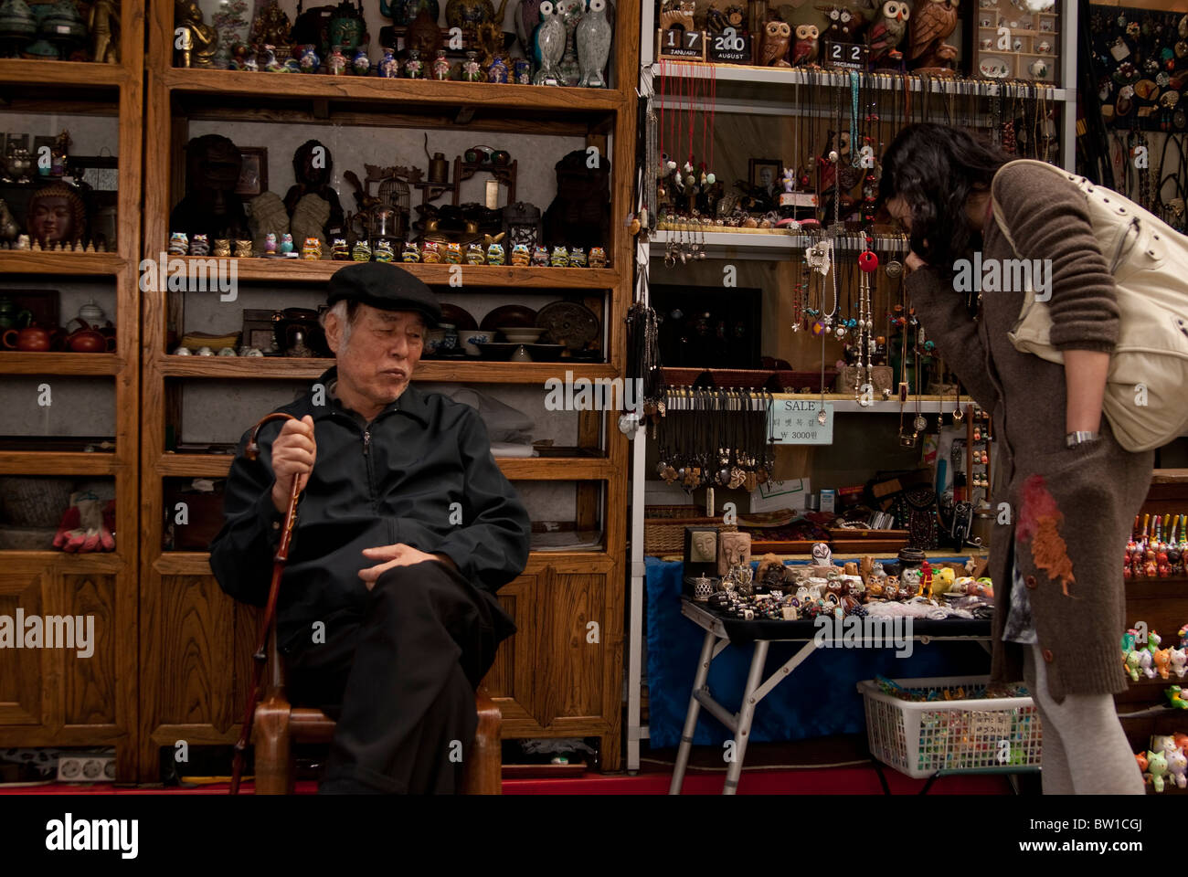 An elderly Korean man selling souvenir goods in Insadong, Seoul, South Korea Stock Photo