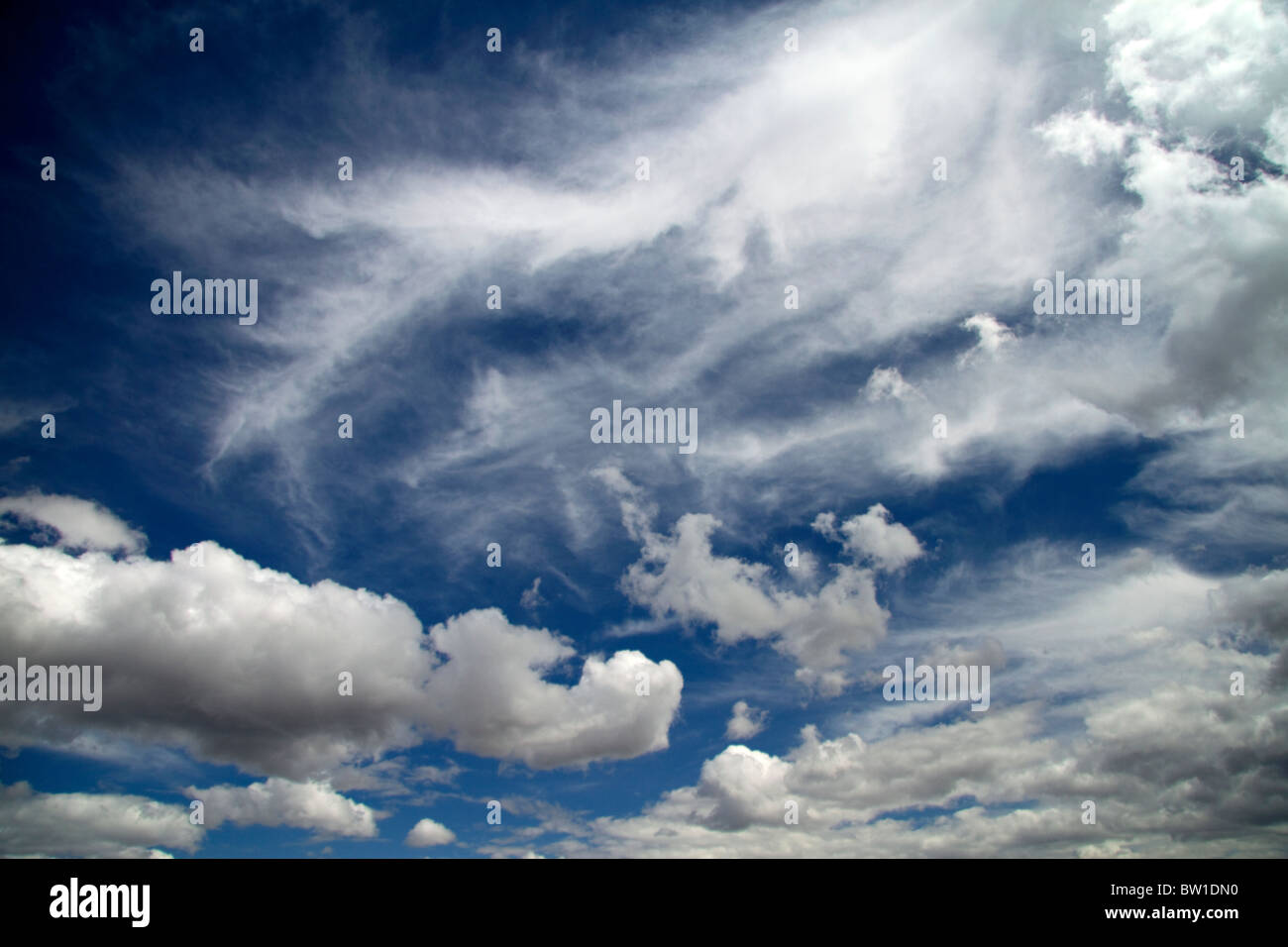 Cumulus and cirrus clouds with blue sky over Idaho, USA. Stock Photo