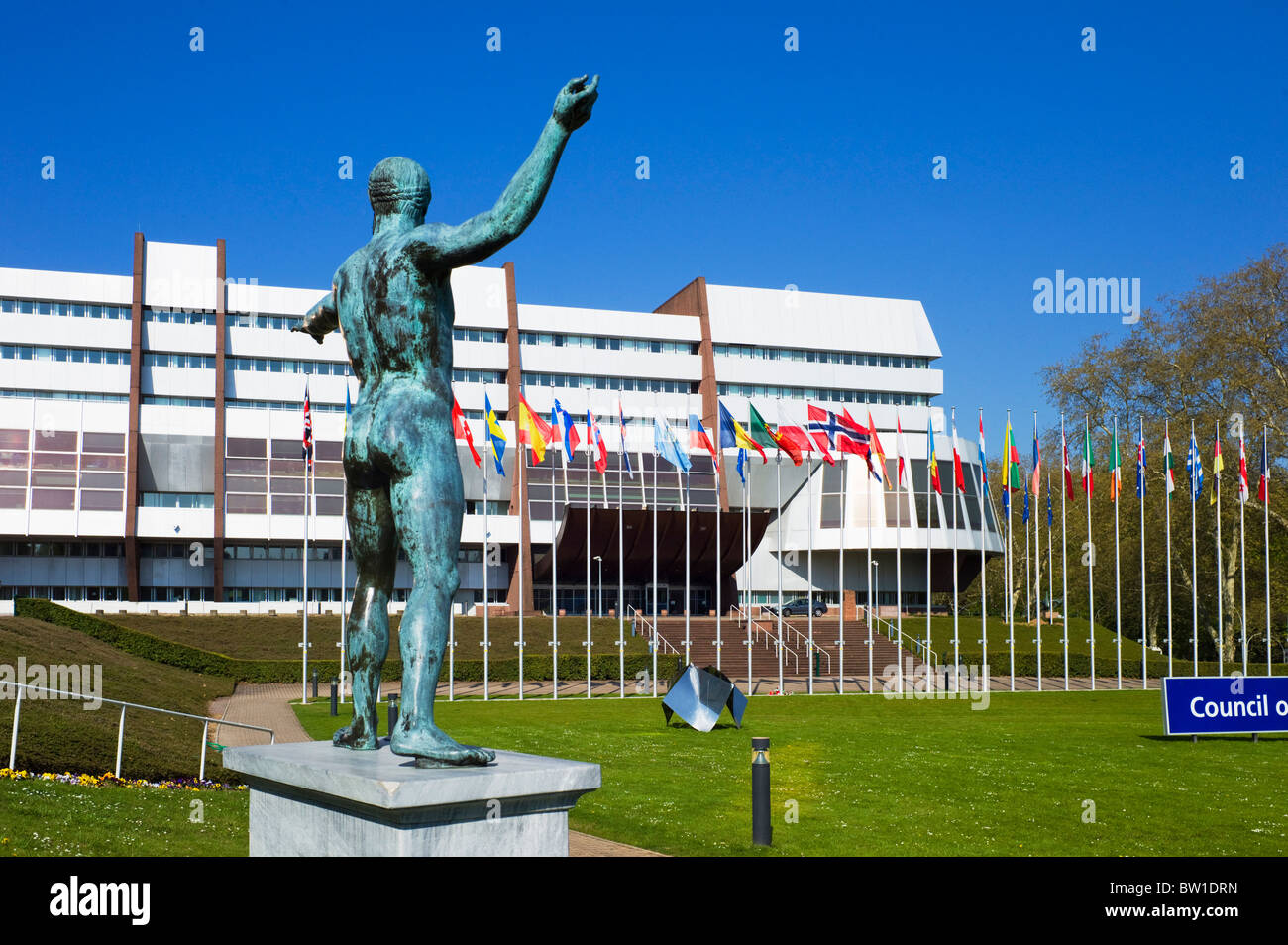 Greek statue of Poseidon - Neptune and Council of Europe building, Palais de l'Europe, Strasbourg, Alsace, France, Europe Stock Photo