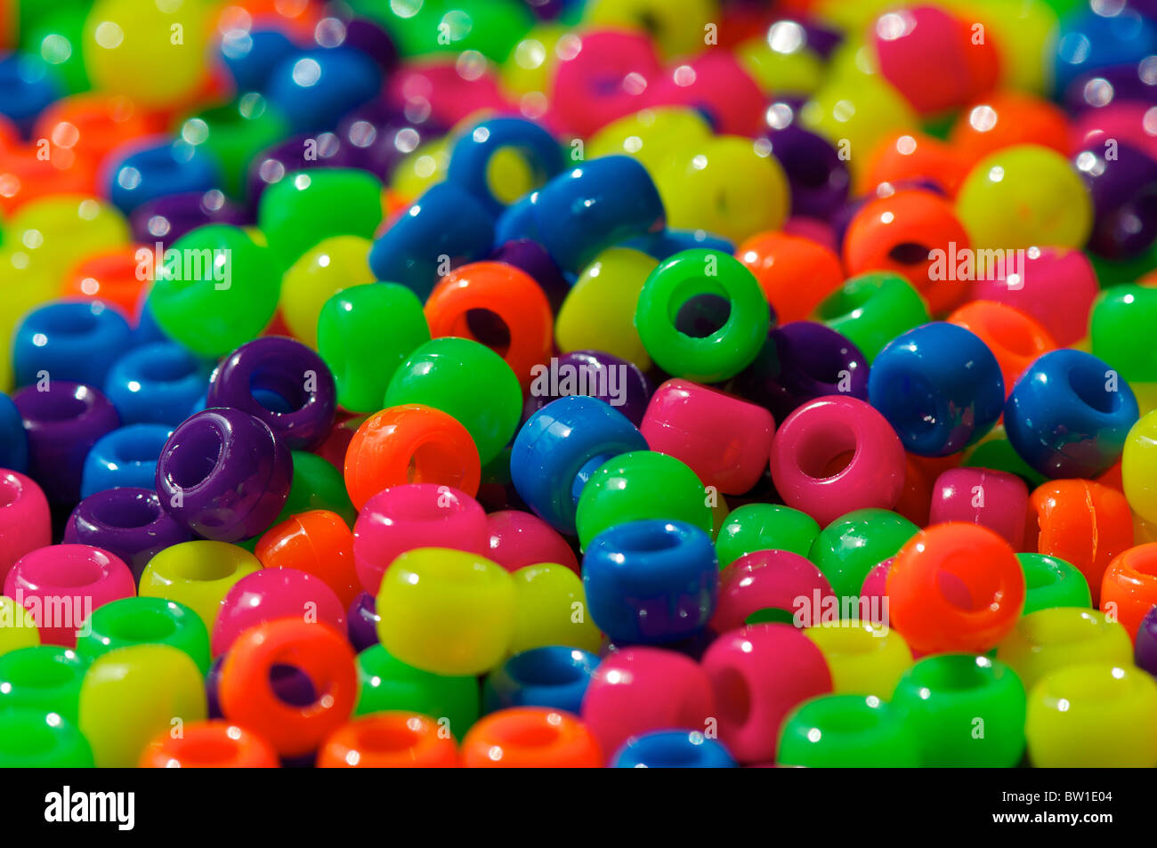 Pile of brightly coloured beads close-up Stock Photo