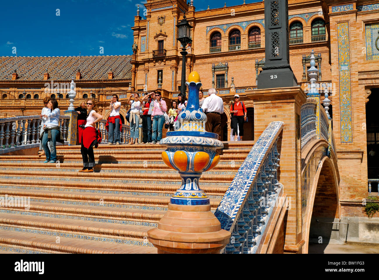 Spain, Andalusia: Tourists at the staircase of the Plaza de Espanha Stock Photo