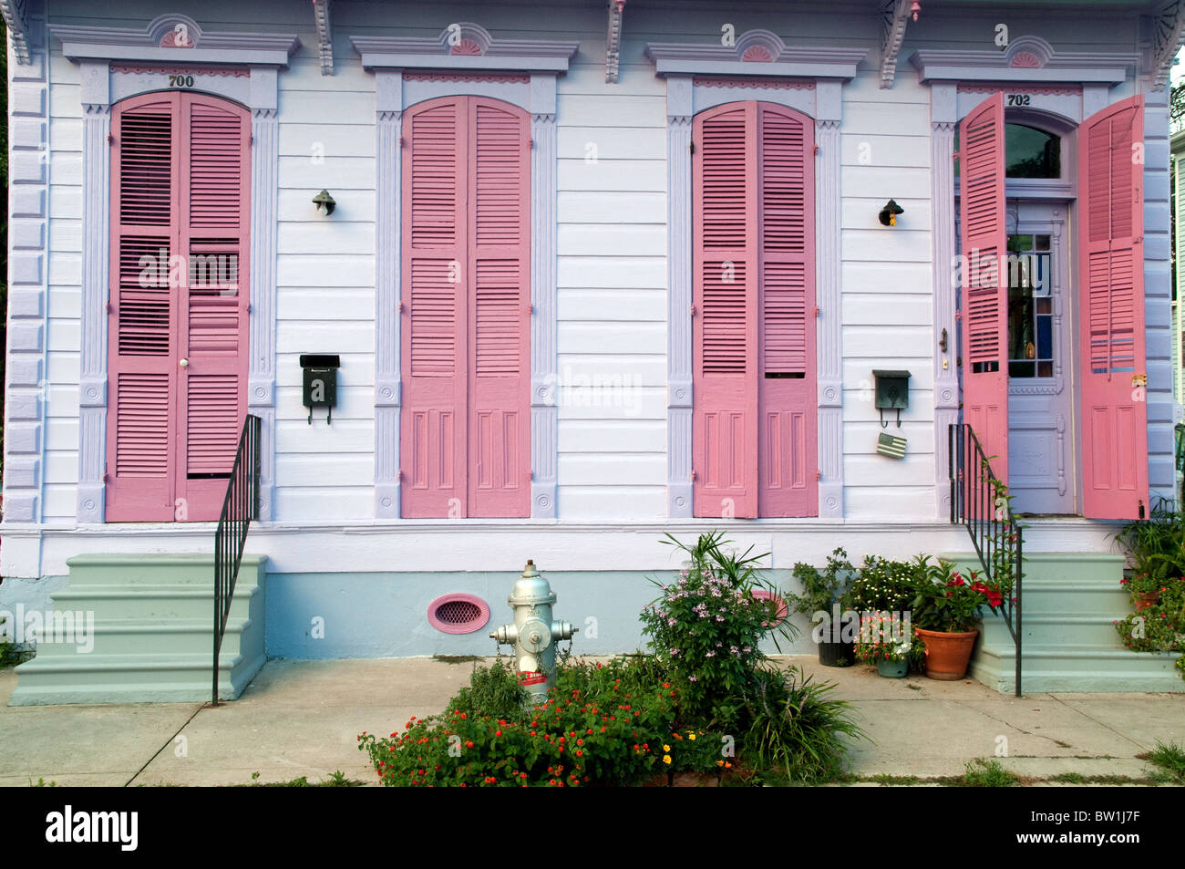 The shuttered doorways and windows of a shotgun house in the Marigny-Bywater neighbourhood of New Orleans, Louisiana, United States. Stock Photo